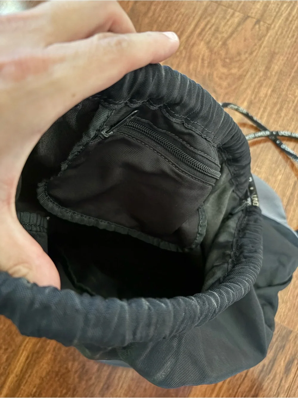 Under Armour Black and Gray Drawstring Backpack with Front Zip Pocket